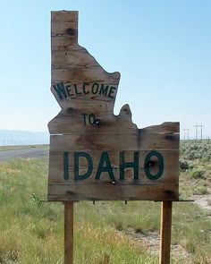 a welcome to idaho sign in the middle of nowhere