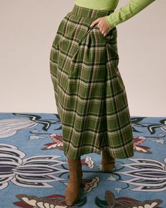 Green Pleated Skirt For Fall, Green Midi Skirt Bottoms For Winter, Green Long Skirt Bottoms For Fall, Green Long Skirt For Fall, Green Lined Maxi Skirt For Fall, Green Pleated Maxi Skirt For Fall, Fall Green Lined Maxi Skirt, Green Pleated Winter Skirt, Plaid Midi Skirt