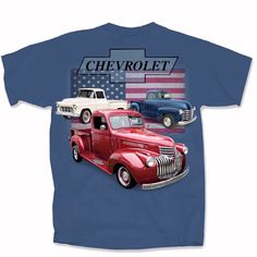 an image of two old trucks on a blue shirt