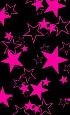 many pink stars are flying in the air