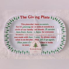 a christmas plate with the giving plate written on it