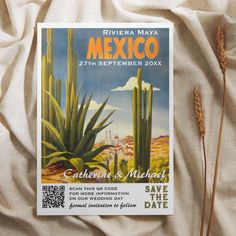 an old mexico travel poster is displayed on a bed with white linens and pillows