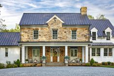 a large brick house with white trim and windows