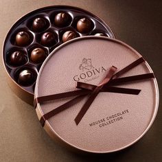 an open box of chocolates on a table