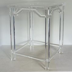 an acrylic side table with clear legs