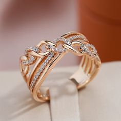 a diamond ring sitting on top of a white box