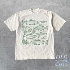 ABOUT THIS PRODUCT - Originally designed by Oldschoolcult (Hand drawn by Timo) - Runs true to size (Relaxed fit) - For oversized fit go one sizes up your normal size - Comfortable unisex fit - 100% cotton - Professional high quality print TYPES - Available in given colors and sizes - See pictures for example ORDER & SHIPPING - It will take 1-4 business days to print and ship. Estimated shipping times are given but in almost all cases, the items are delivered before the latest date. AFTERCARE - Wash inside out at 30oC or 90oF - Do not dry clean or tumble dry RETURNS - As every item is made to order we usually cant accept returns - But if you have any issue with your item please contact us we are happy to help OTHER - If you have any questions regarding this product, don't hesitate to ask. Ocean Shirt, Fish Shirt, Fish Tattoo, Vintage Fishing, Style T Shirt, Fishing Shirts, Tattoo Style, Original Design, Halloween Shopping