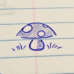 a drawing of a mushroom on lined paper