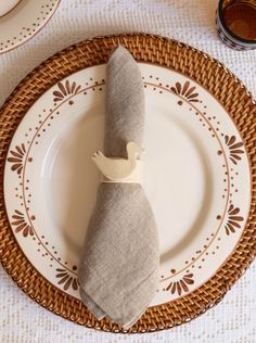 a plate with a napkin on top of it