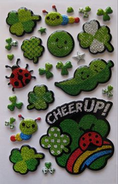 the patches are all different colors and sizes, but one is green with ladybugs on it