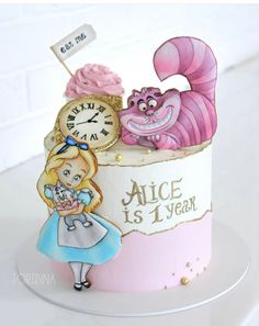 there is a cake with an image of alice and wonderland on it