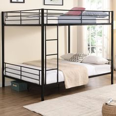 a black metal bunk bed in a bedroom