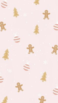 a pink and gold christmas wallpaper with gingerbreads