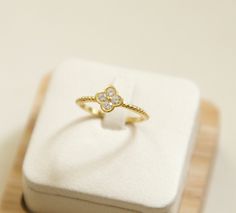 Introducing our CZ Diamond Clover Ring, a stunning piece crafted in gold vermeil, perfect for those seeking a touch of elegance. The intricate design features a charming clover band ring made from high-quality sterling silver 925, exuding both sophistication and style. This four leaf clover ring makes a delightful choice for engagements, anniversaries, or as a promise ring. Adorned with sparkling CZ diamonds, it adds a touch of glamour to any outfit. Embrace luck and beauty all in one with this exquisite clover ring - a true symbol of love and good fortune. size : 6 and 7 material:sterling silver 925, gold vermeil and CZ cubic zirconia comes with a gift box. View more jewelry HERE:  https://www.etsy.com/shop/DearMia?ref=listing-shop2-all-items-count#items Luxury Tarnish-resistant Diamond Ring As Gift, White Gold-plated Diamond Ring Gift, Gift Yellow Gold Diamond Ring Tarnish Resistant, Gift Yellow Gold Diamond Ring, Gold Plated Brilliant Cut Rings For Gift, Tarnish Resistant Yellow Gold Diamond Ring Gift, Gold Plated Rings With Brilliant Cut For Gift, White Gold Diamond Ring Gift, Tarnish Resistant, Yellow Gold Diamond Ring As Gift