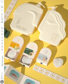 an assortment of personal care items on a yellow surface with japanese writing and stickers