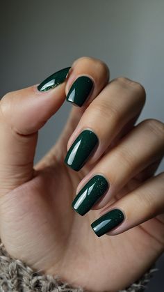 Achieve the perfect 'Dark Emerald Green Nails' look with this stunning acrylic coffin design From acrylic almond to short gold prom designs this post covers it all Explore French tip silver chrome simple chrome designs almond acrylic coffin for prom and shimmering shellac polish art Perfect for those looking for a fashionable and glamorous nail design