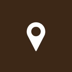 a brown and white map pointer icon