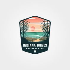 the logo for indiana dunes national park, which is located at the end of a dirt road