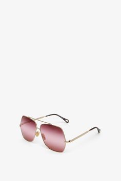 Gold and gradient pink sunglasses from Chloé. The Aly modern aviator sunglasses feature square frames in shiny gold metal set with triple gradient lenses in a palette of burgundy, pink and red. The Chloé logo finishes the left lens.100% UVA and UVB protectionFilter category: 1Not prescription friendlyLens: 62 mmBridge: 12 mmTemple: 140 mmMade in Italy Chloe Logo, Pink Sunglasses, Pink And Red, Square Frames, Aviator Sunglasses, Gold Metal, Chloe, Lenses, Sunglasses