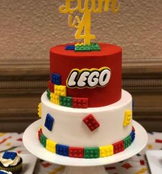 a birthday cake with lego blocks on top