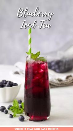 blueberry iced tea in a tall glass with mint garnish