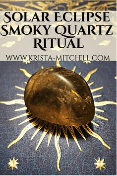 a close up of a metal object with the words solar eclipse smoky quartz ritual