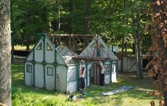 there are many small houses in the woods