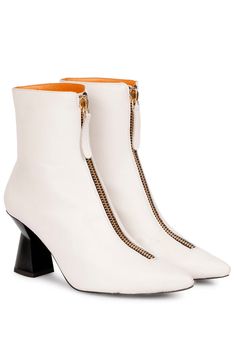 Get ready for winter fun. Walk a little taller in these beautiful Rose off-white leather ankle boots. The front chain on these pointed boots is the perfect way to add a little glam to your everyday look. Featuring front zip closure, a pointed toe, off-white leather upper, leather lining, and branded leather insole. The slip-on boot sits on a sculpted heel. Pair with a cute day dress and kill it! Dress And Cowboy Boots, White Leather Ankle Boots, White Leather Boots, Pointed Boots, Fun Walk, Slip On Boots, White Heels, White Party