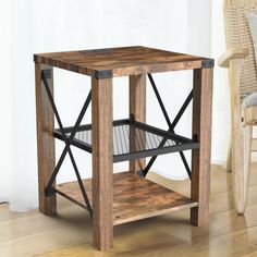 a small wooden table sitting on top of a hard wood floor