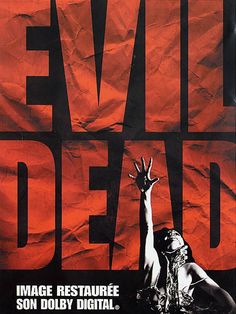 a movie poster for the evil dead with an image of a woman holding her hand up