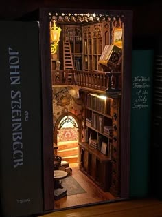 an open book case sitting on top of a wooden table