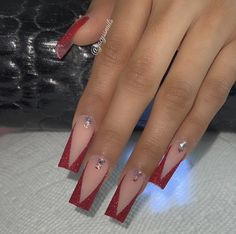 Red And Bling Nails, Red French Tip Nails Coffin With Design, Nails Inspo For Red Dress, Red V Shape French Tip Nails, Red Nails Mid Length, Red Tapered Square Nails Medium, Red Prom Heels Sparkle, Black Rhinestone Nails Short, 8th Grade Prom Dresses Long Red