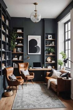 a living room filled with lots of furniture and bookshelves next to a window