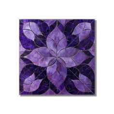 a purple and black tile with leaves on it