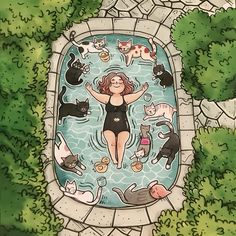 a woman in a pool surrounded by cats