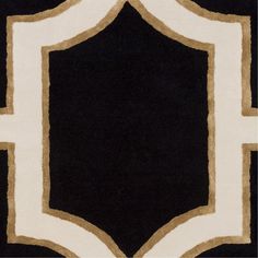 a black and white area rug with gold trimmings on the edges in an arch shape