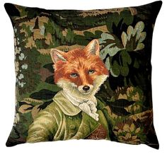 a pillow with a painting of a fox on it's face and green leaves