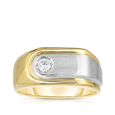 a gold and silver ring with a diamond