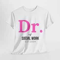 a white t - shirt with the word dr on it and pink letters that read, social work est 20104