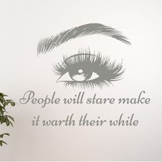 there is a wall decal with an eye and words on it that says people will stare make it worth their while