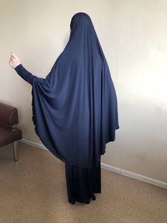 Unique maxi dress with khimar cape made by shiny jersey. Elegant abaya with a long sleeve, high cuff. The cuffs and hem dresses are decorated with lace. The warmth is slightly enlightened, so we sewed khimar cape lice a hijab for this dress! Free size Be feminine and beautiful, we are always happy to help you in your choice, you can write any questions in the message. We accept individual orders, this means that we can sew a dress of any size, style and color! Modest Blue Niqab For Eid, Blue Modest Khimar For Eid, Blue Long Khimar For Eid, Long Blue Khimar For Eid, Blue Long Sleeve Modest Khimar, Modest Long Sleeve Solid Khimar, Blue Modest Long Abaya, Modest Blue Maxi Length Abaya, Muslim Maxi Dress