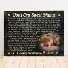 a wooden sign with a dog's paw prints on it that says, don't cry sweet mama