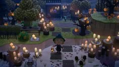 an animated scene with candles lit up in the background and a person standing on a platform surrounded by trees