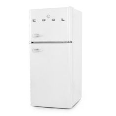 a white refrigerator freezer sitting on top of a white floor next to a wall