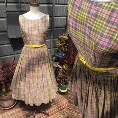 "Sweet, homestyle swing era daydress with a lovely plaid trimmed in gray. Tightly pleated for ample fullness (shown over petticoat in first 2 photos). Comes with belt which is not original but goes nicely with the dress. Worn spot shown in last photo. Metal side zipper. 36\" bust, 28\" waist. Shown on a Size 6 form. No label." Cotton Frocks, Yellow Plaid, Historical Dresses, Petticoat, Cotton Dresses, Plaid, Summer Dresses, Yellow, Womens Dresses