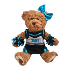 a brown teddy bear with blue cheerleaders on it's chest and legs