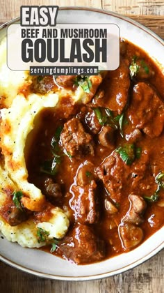 beef and mushroom goulash with mashed potatoes in a white bowl on a wooden table