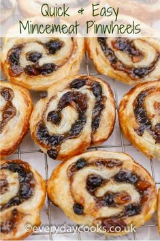 mini cinnamon rolls with raisins on top and the words quick & easy minemeat pinwheels