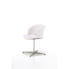 a white chair sitting on top of a metal base