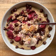 a bowl filled with ice cream and chocolate chips